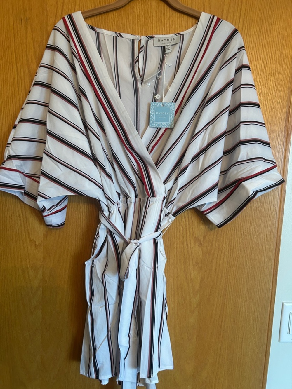 Hayden White Striped Wrap Romper with Red, Pink, & Blue stripes with lined short